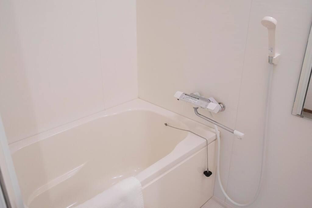 Apartment 【梅田・新大阪・usj近く】最寄駅jr西九条徒歩４分300ｍ！無料wi‐fi！２dk一軒家貸切！n