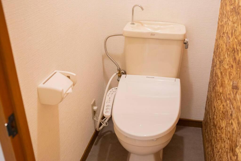 Apartment 【梅田・新大阪・usj近く】最寄駅jr西九条徒歩４分300ｍ！無料wi‐fi！２dk一軒家貸切！n